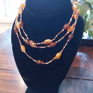 Beautiful  beaded necklace can be worn a many different ways/ lengths